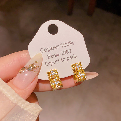Buy Ultra-Shimmering Zircon Geometric Stud Earrings online at Fashionner.