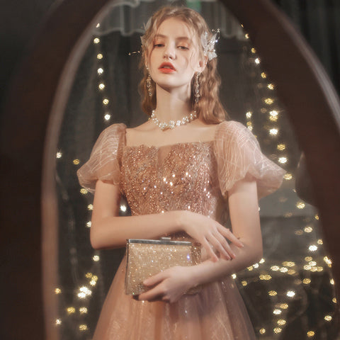Robe de soirée dorée à manches bouffantes pour femme