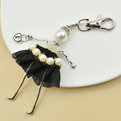 Porte-clés pour femme, pendentif de sac à main fait à la main avec personnage de dessin animé