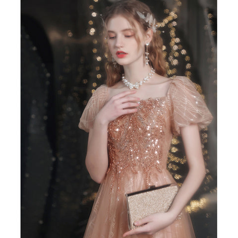 Robe de soirée dorée à manches bouffantes pour femme