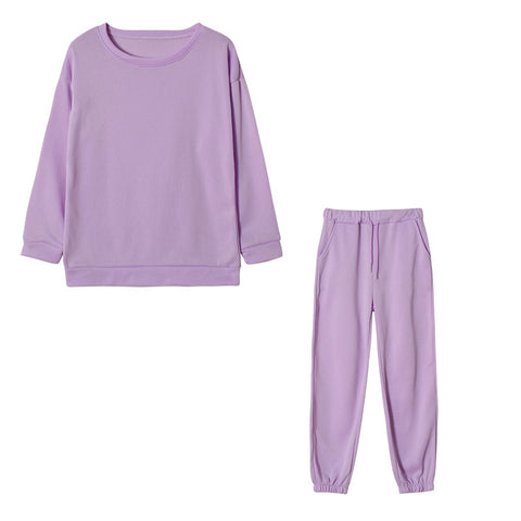 Ensemble sweat à capuche deux pièces de couleur unie pour femmes, style athleisure.